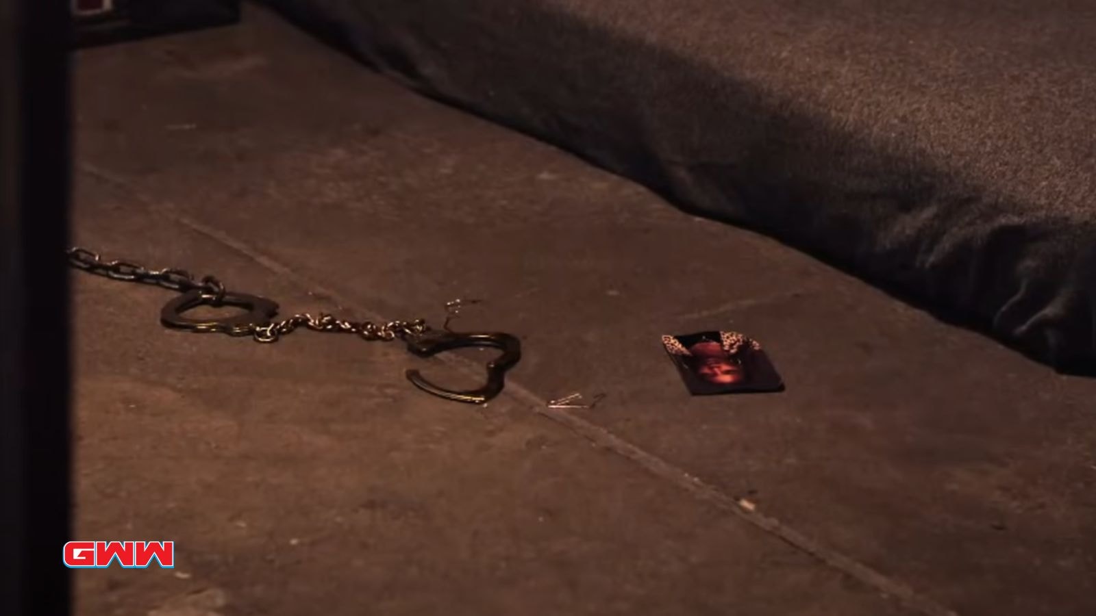 Found Season 2: Handcuffs with a photo on the floor