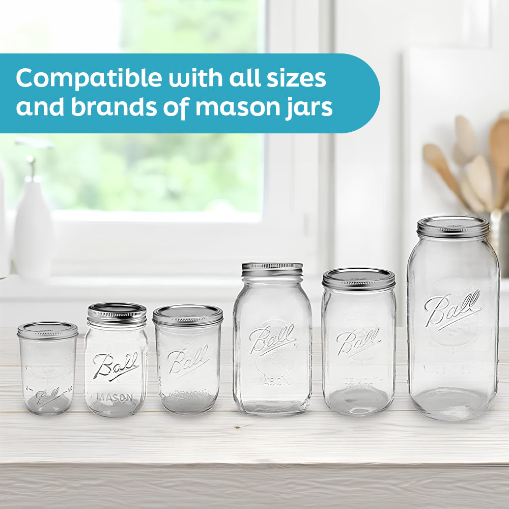 Various sizes of Ball mason jars displayed on a countertop.