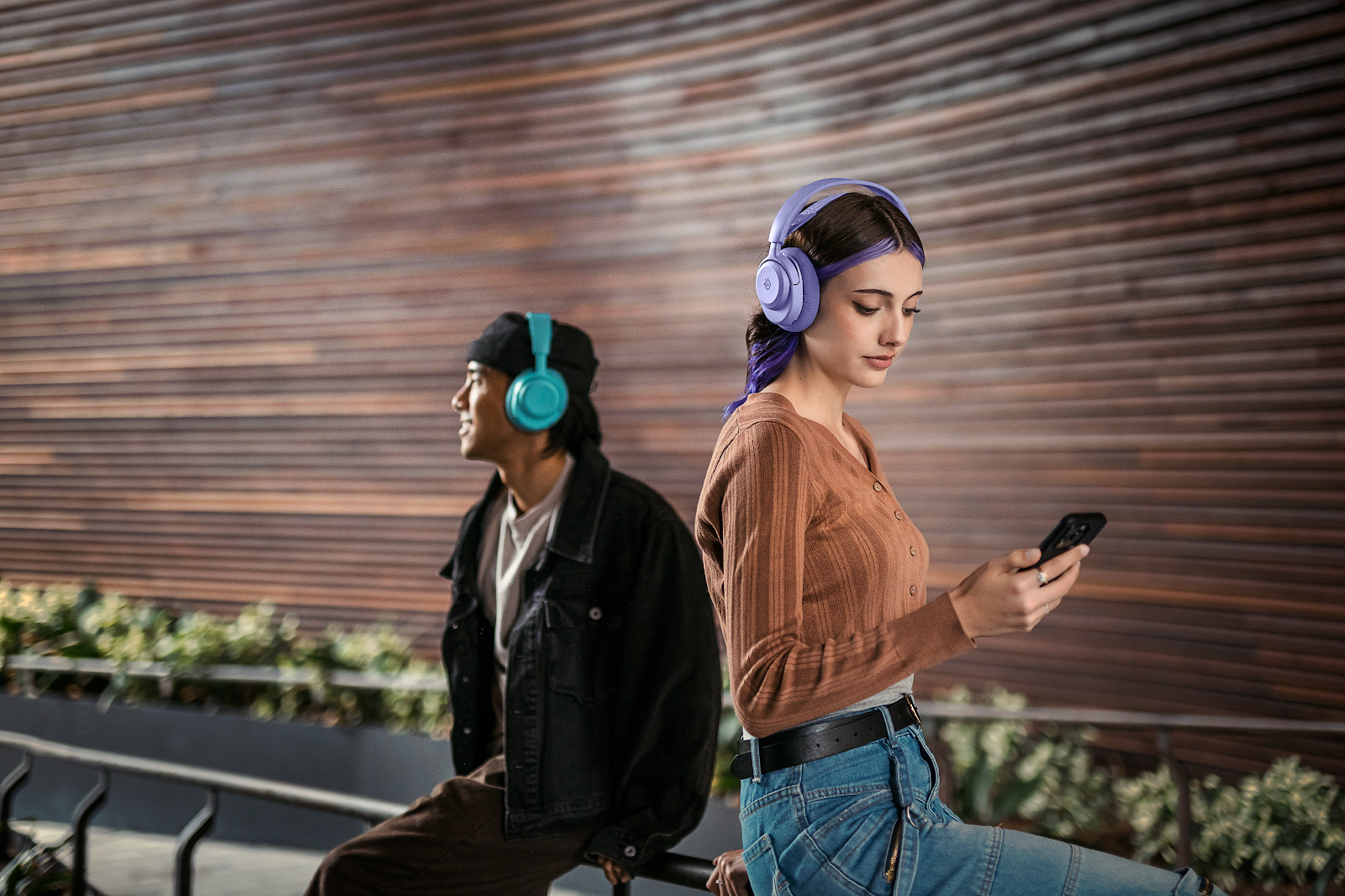 A person and person wearing headphones

AI-generated content may be incorrect.