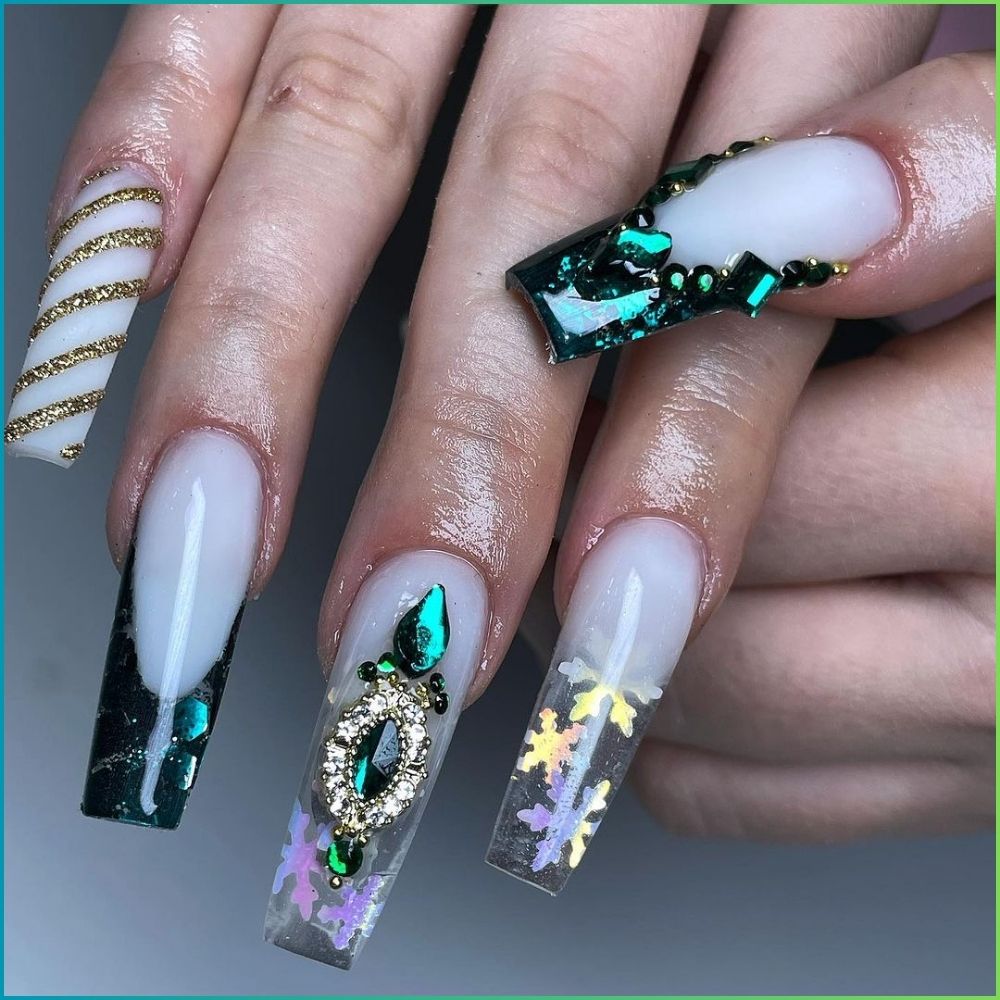 Close up of hands with Christmas Green Nails having  Crystal-studded green nails