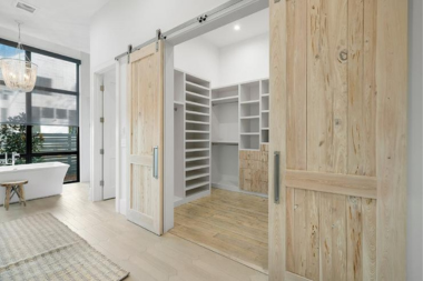 factors that affect the cost of a walk in closet wood barn sliding door custom built michigan