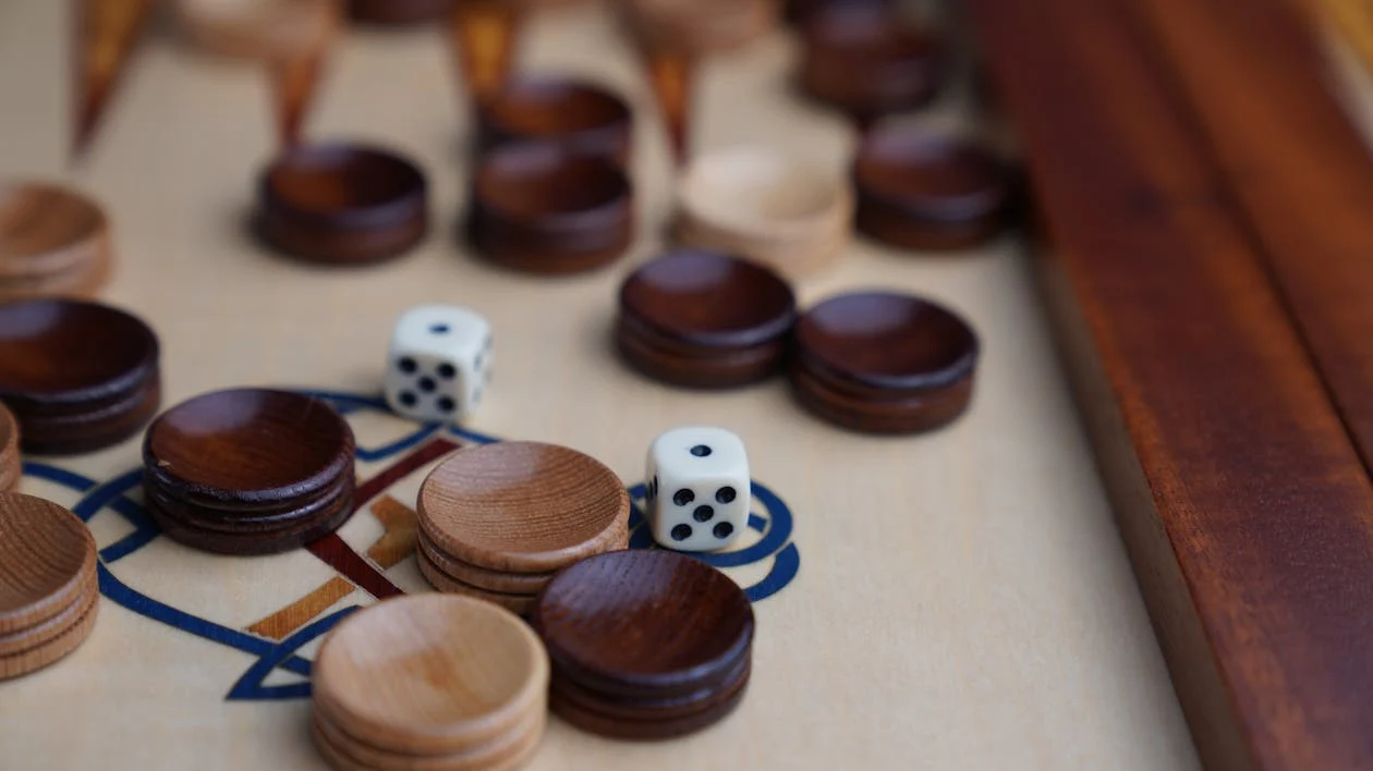 Photo by Nico Meucci: https://www.pexels.com/photo/close-up-photo-of-dice-9126623/ 