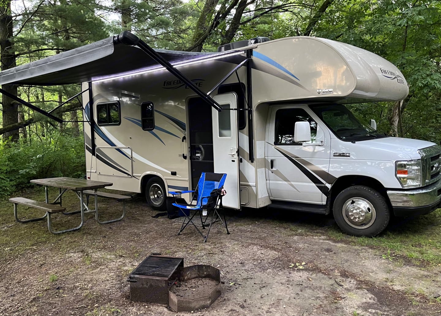 Class C RV at camp