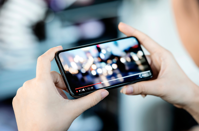 person-watching-a-video-on-smartphone