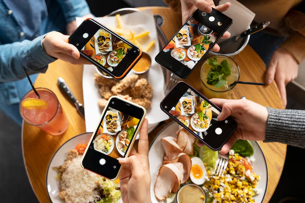 People taking photos of their food for user-generated content
