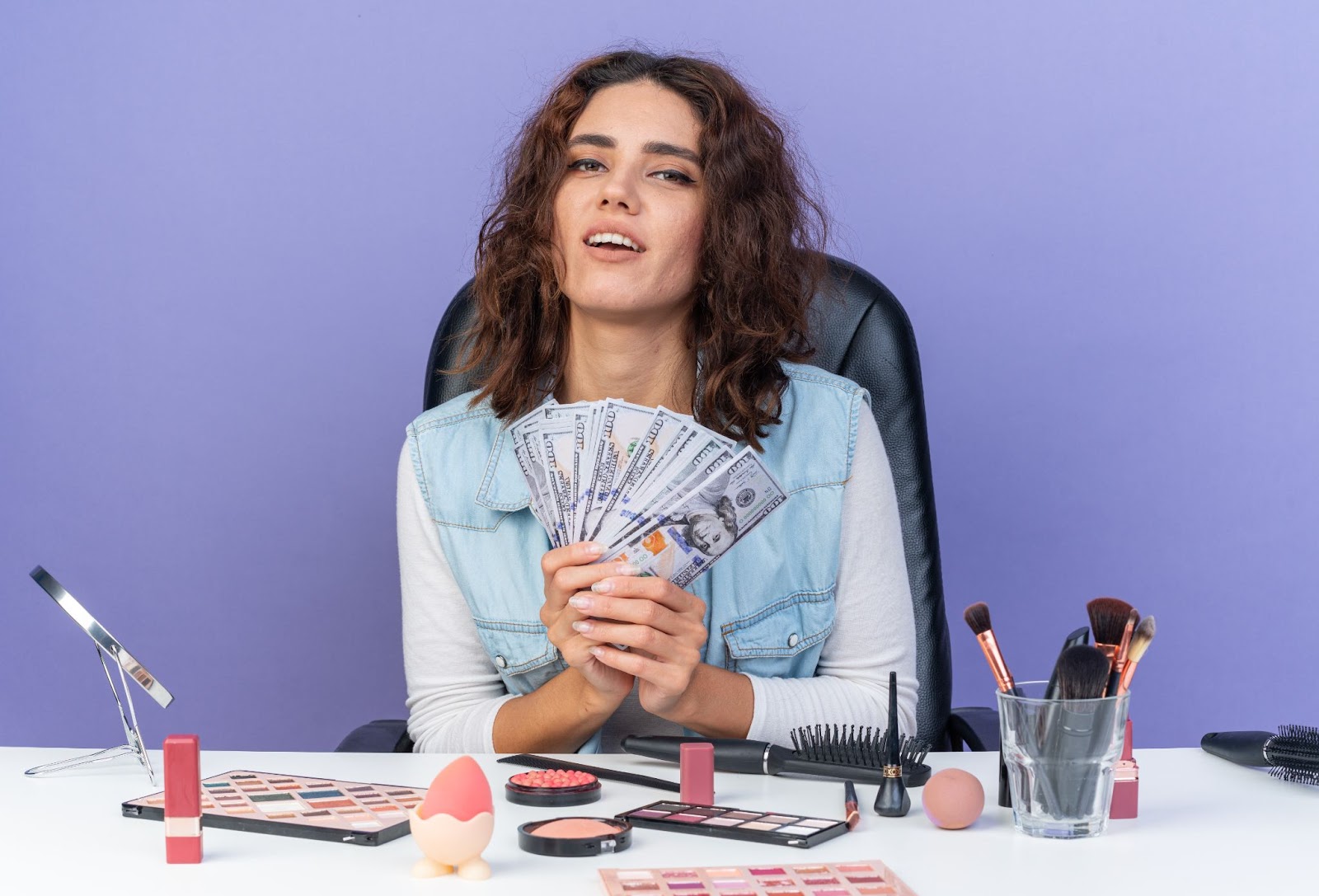 Girl holding money in her hand
