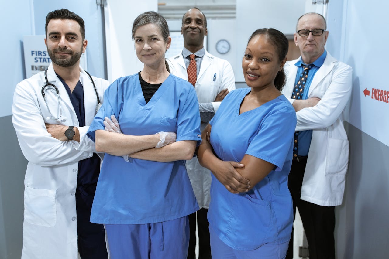 Medical workers standing next to one another // Healthier Baby Today