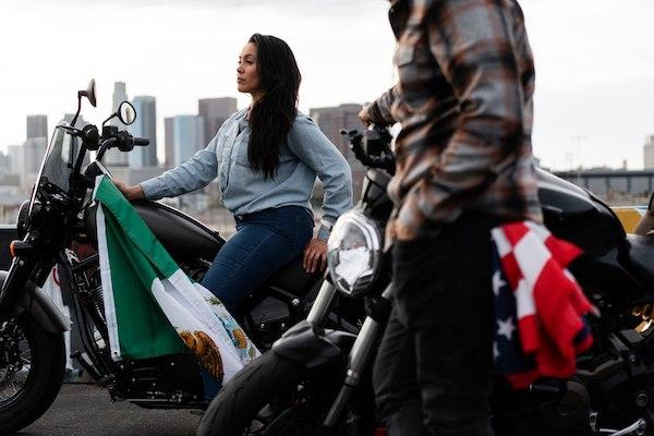 woman-holding-mexican-flag-street_23-2149372995