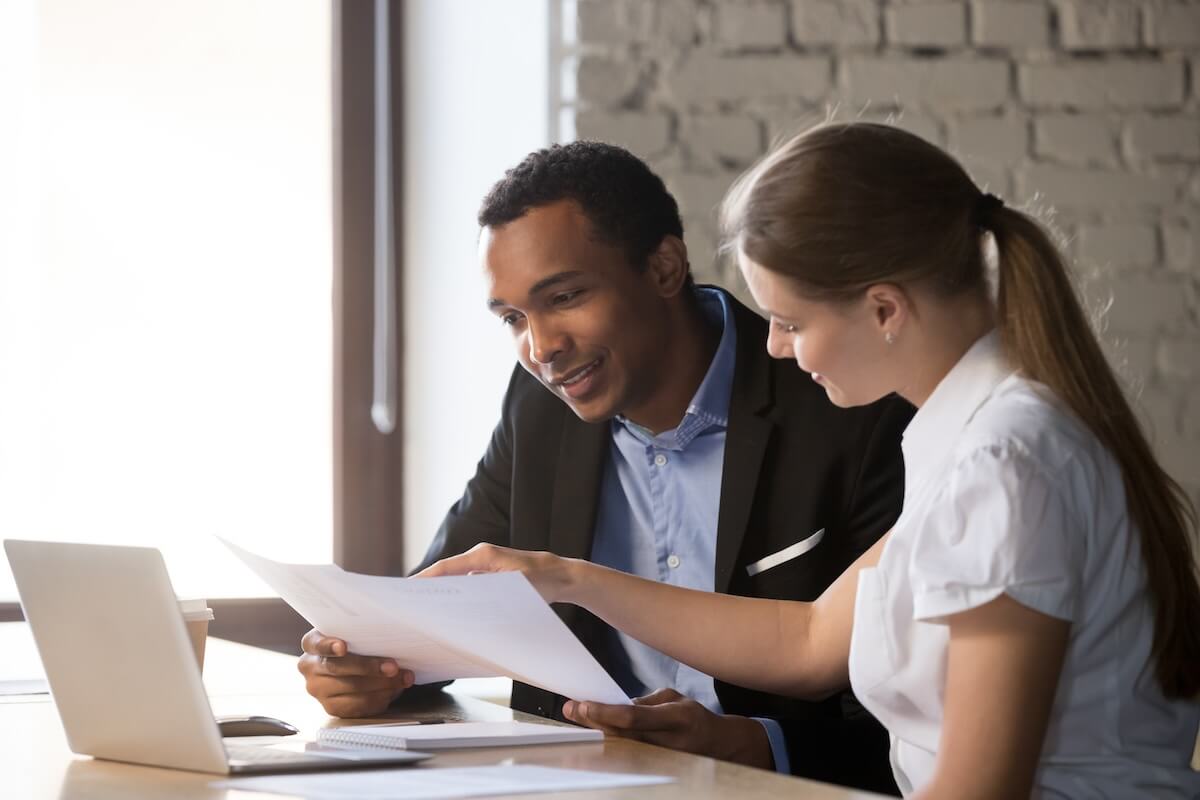 Employees reading some documents