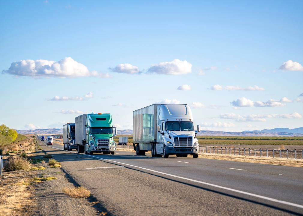 Semitrucks on a highway.