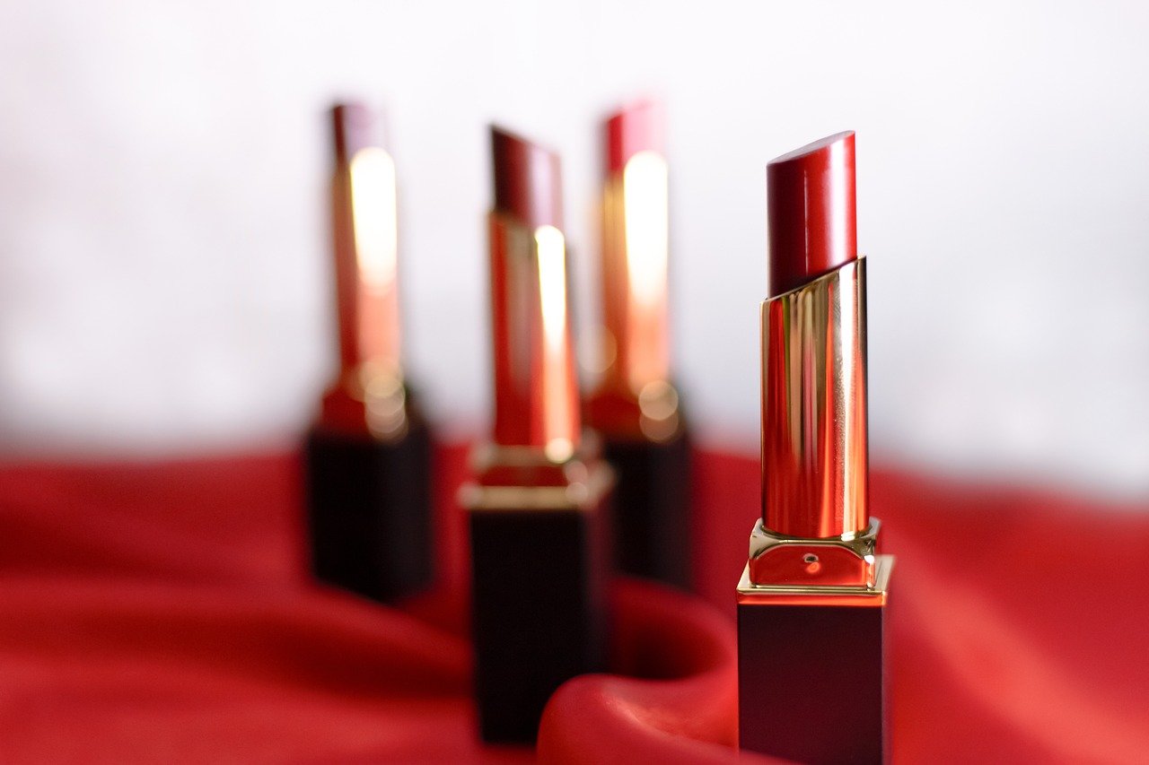 Various shades of lipstick. Blurred background. 