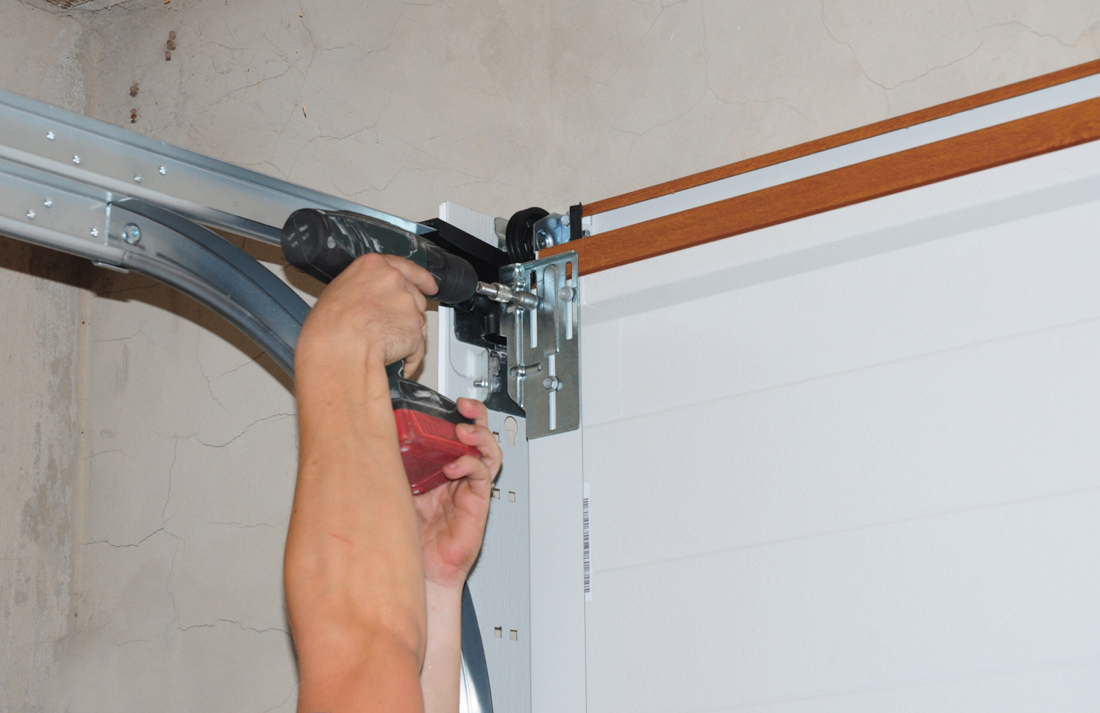 how to install garage door rollers