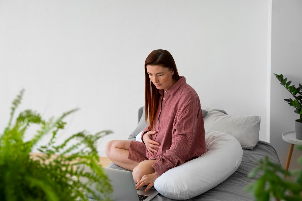 Pregnant Woman Feeling Exhausted While Working from Home