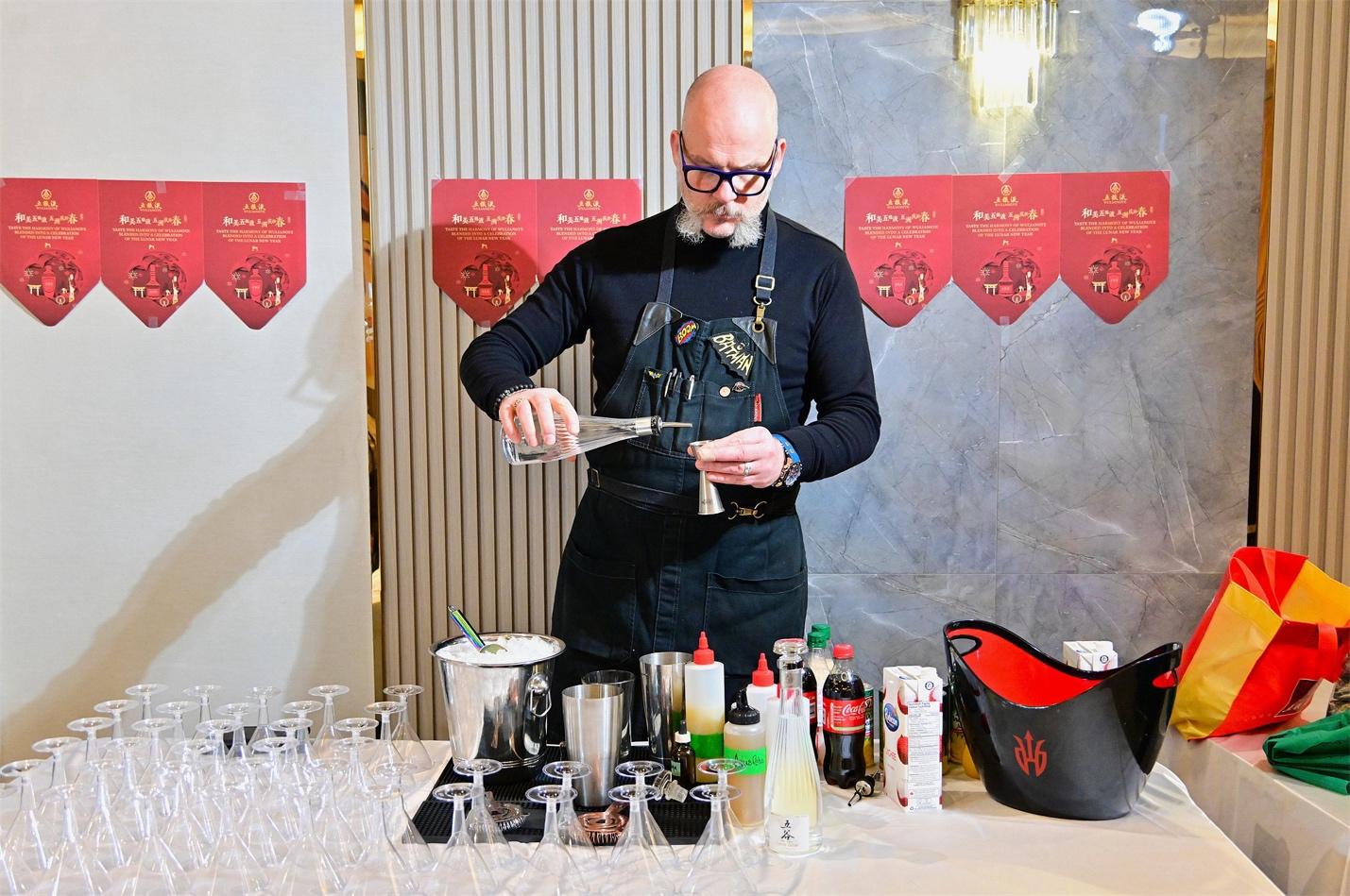 A person pouring liquid into a glass

AI-generated content may be incorrect.