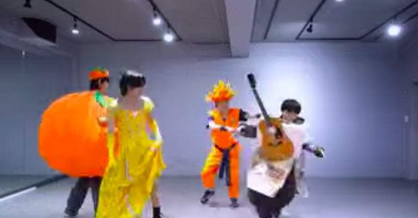 This contains an image of The members of 1VERSE in  Halloween costumes 