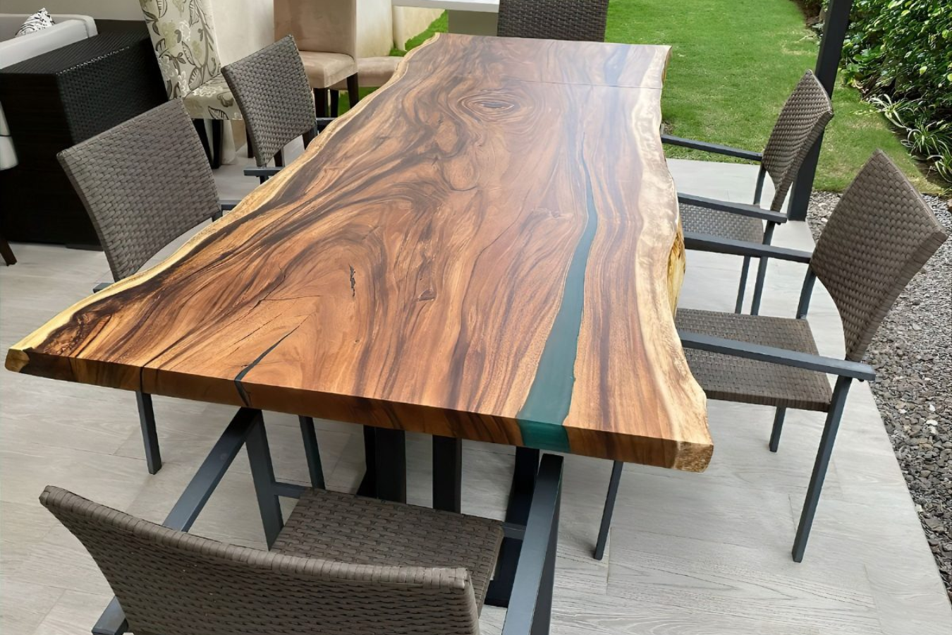 live edge table with resin work placed near lawn