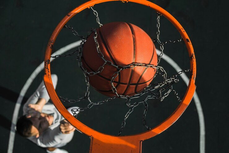 basketball falling through ring close up