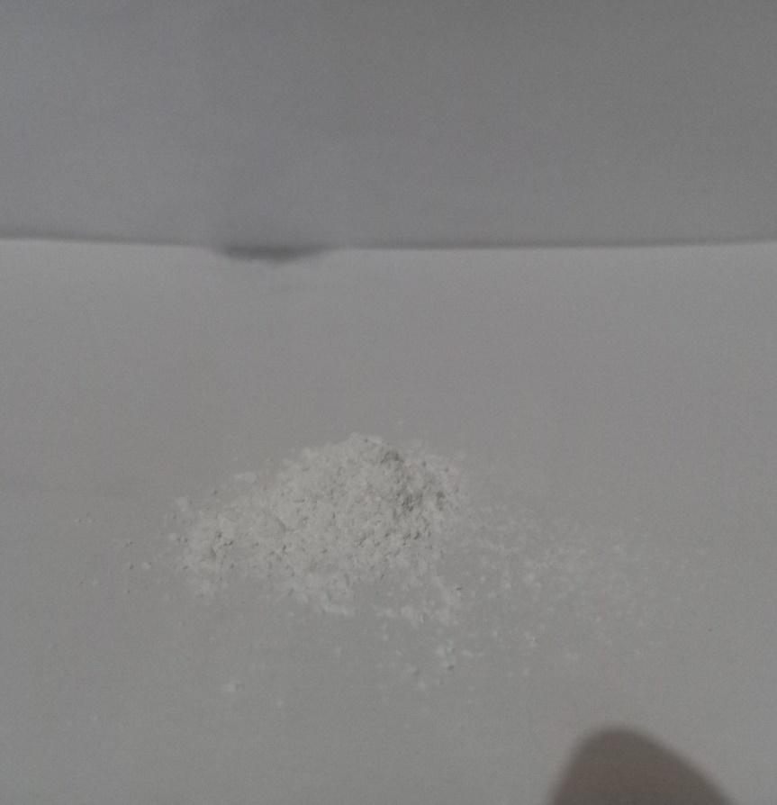 A pile of white powder

Description automatically generated