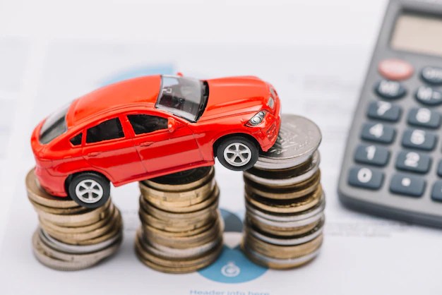 Toy car balancing over the increasing coin stack