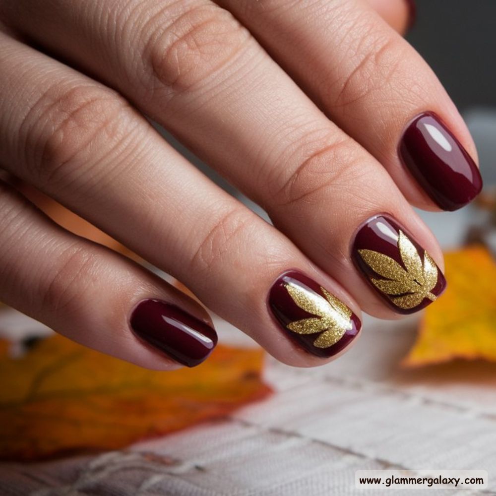 Thanksgiving Nail Designs having Gold Glitter Leaf Accent Nails
