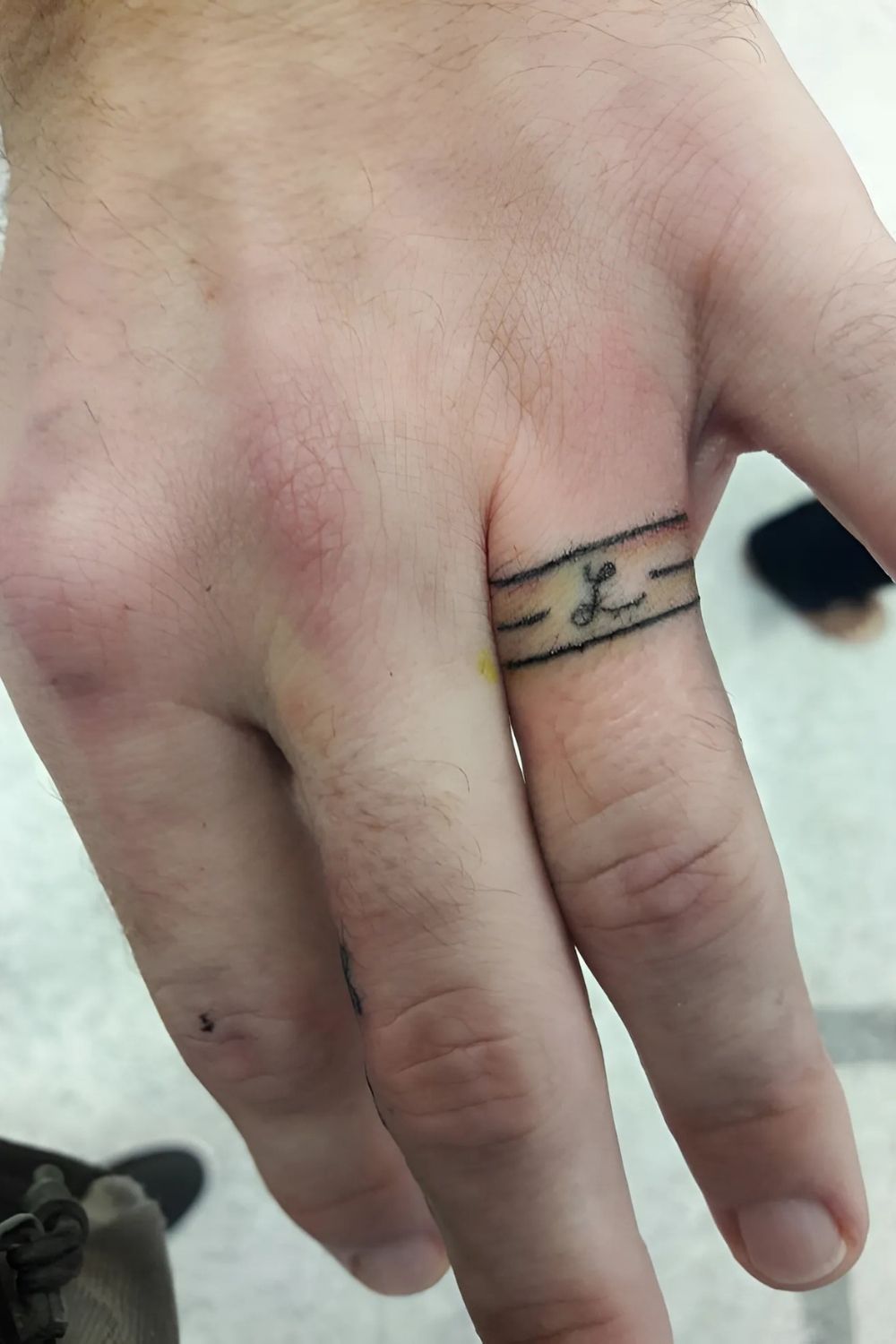 Initial Finger Tattoo