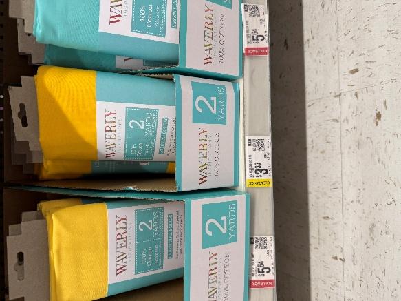 A group of blue and yellow blankets on a shelf

AI-generated content may be incorrect.
