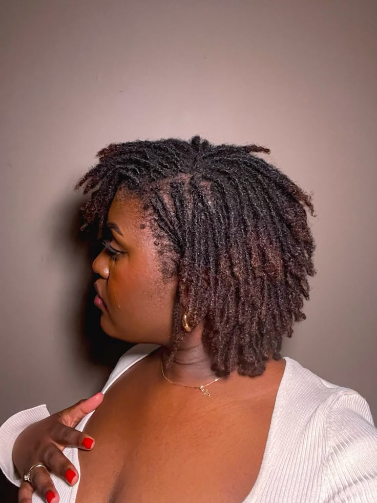 short locs style with brown tips