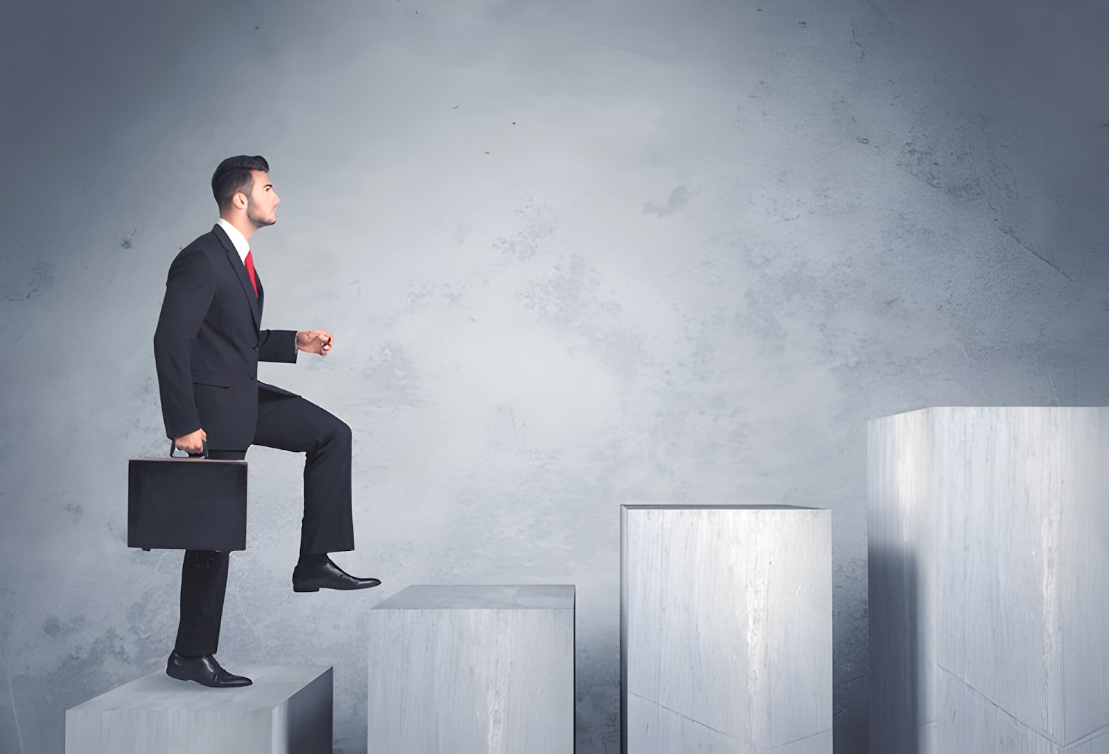 Businessman ascending symbolic steps, representing job opportunities and career progression in the accounting field.