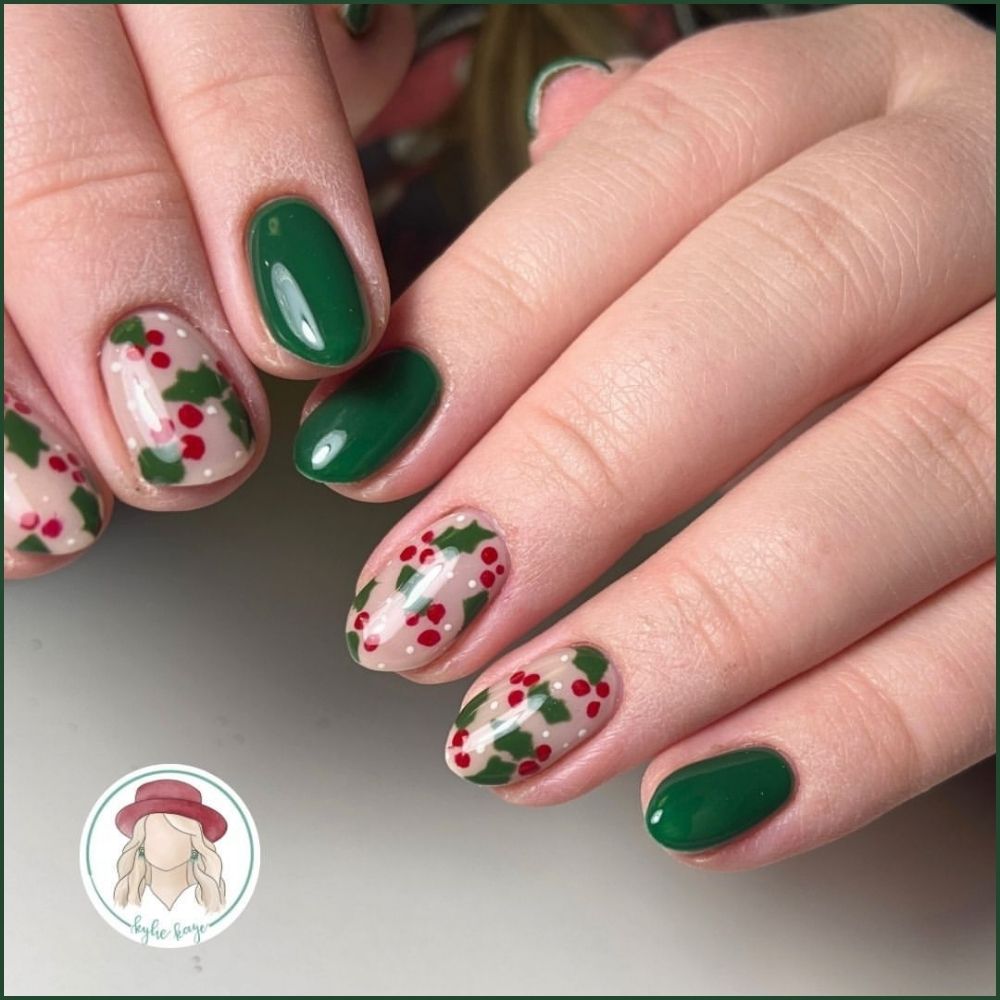 Close up of hands with Christmas Green Nails having  Holly Berry Art