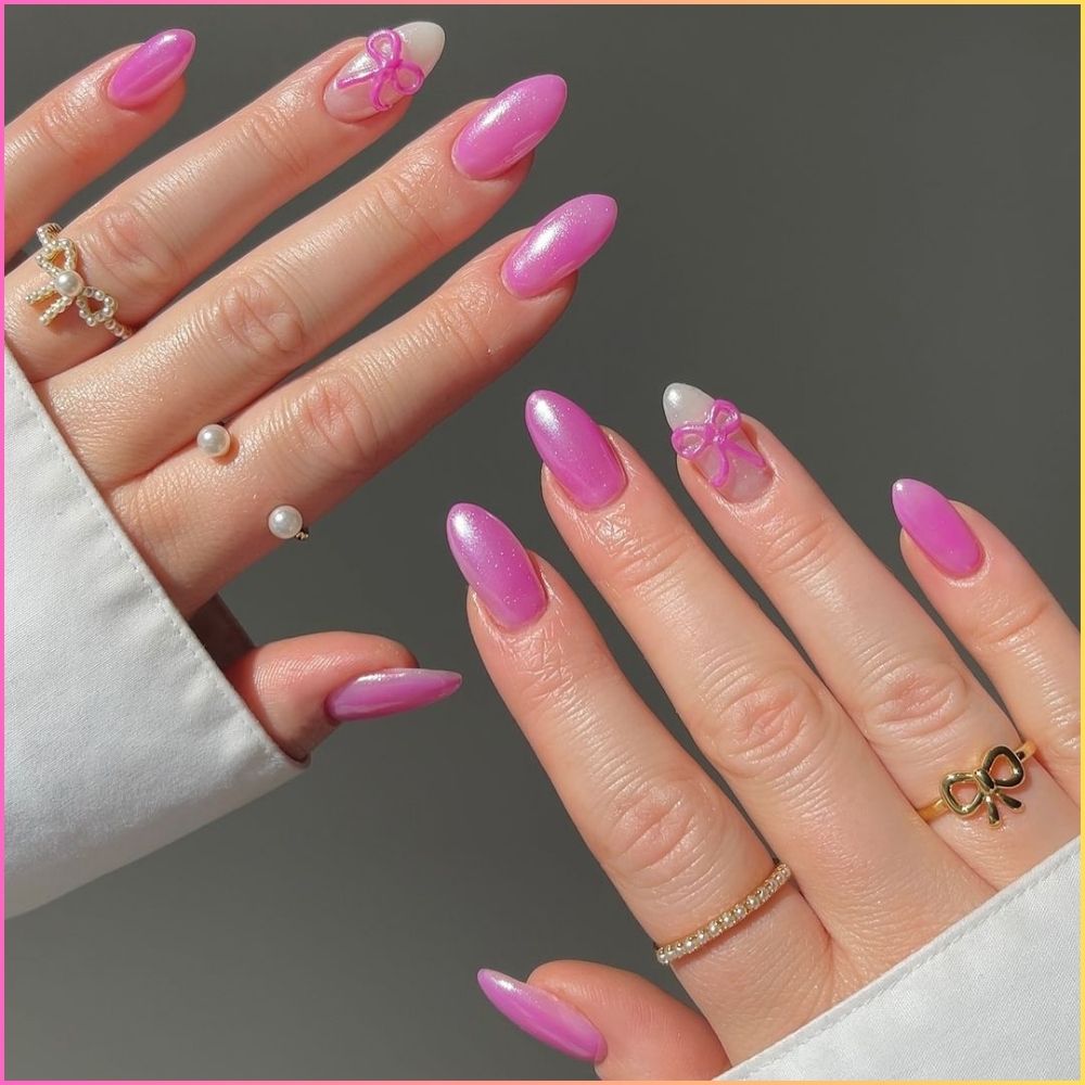 Close up of nails with simple pink nail designs having Pink Ribbon Nails