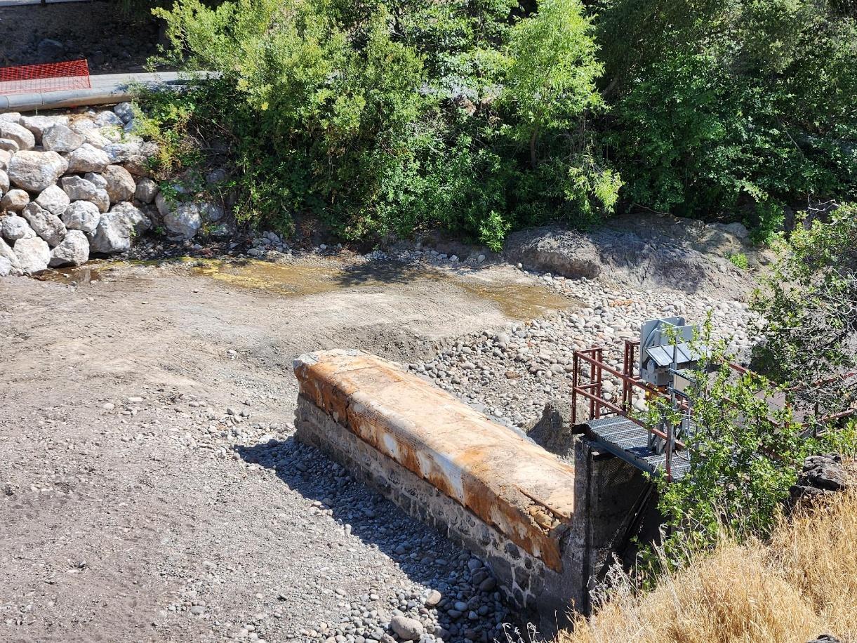 A bridge over a rocky river

AI-generated content may be incorrect.