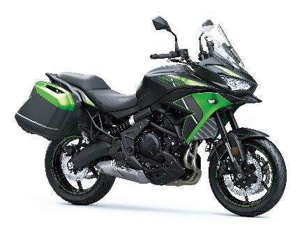 A black and green motorcycle

Description automatically generated