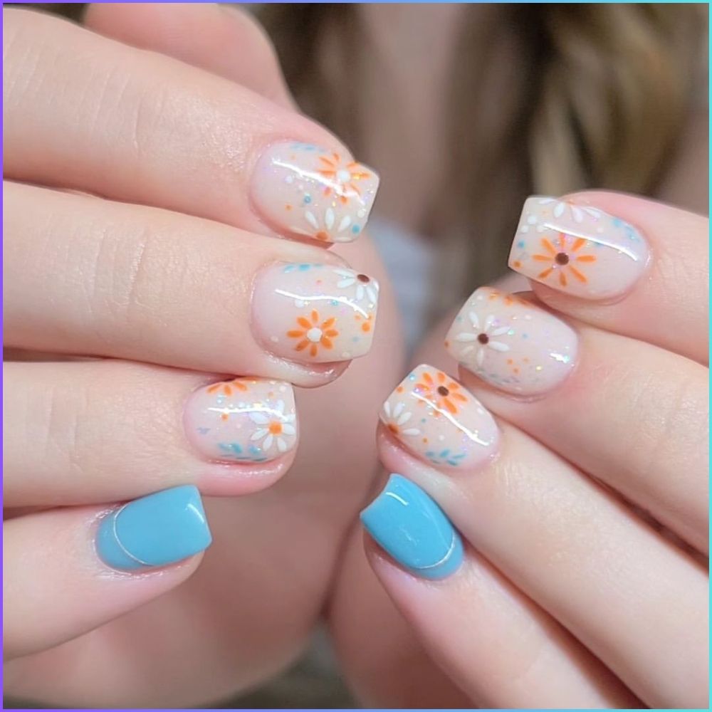 Close up of flowered short nail design with Cute short nails