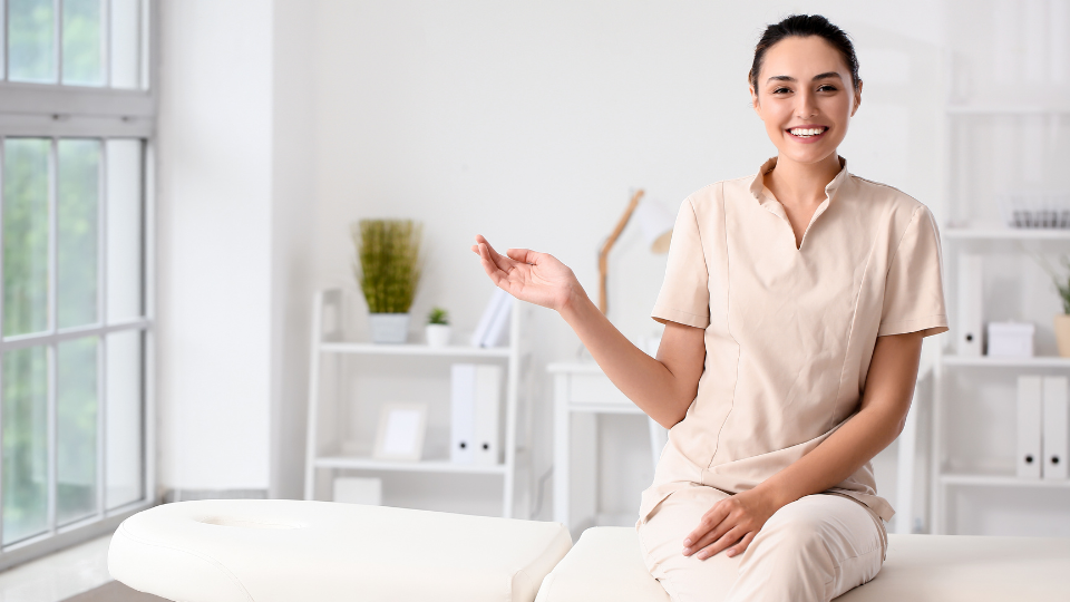 Massage therapist on a massage table