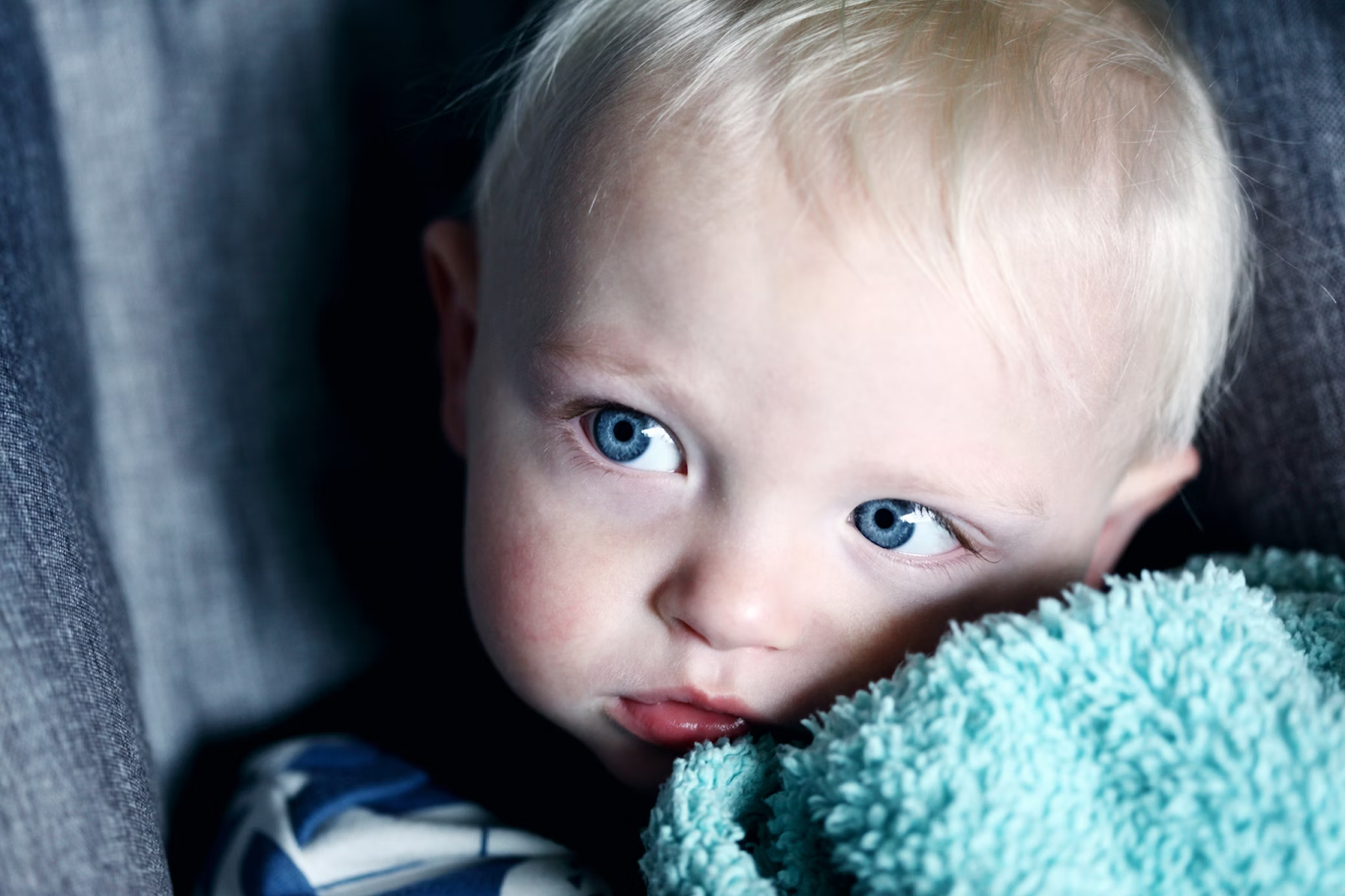 Baby Boy holding blanket