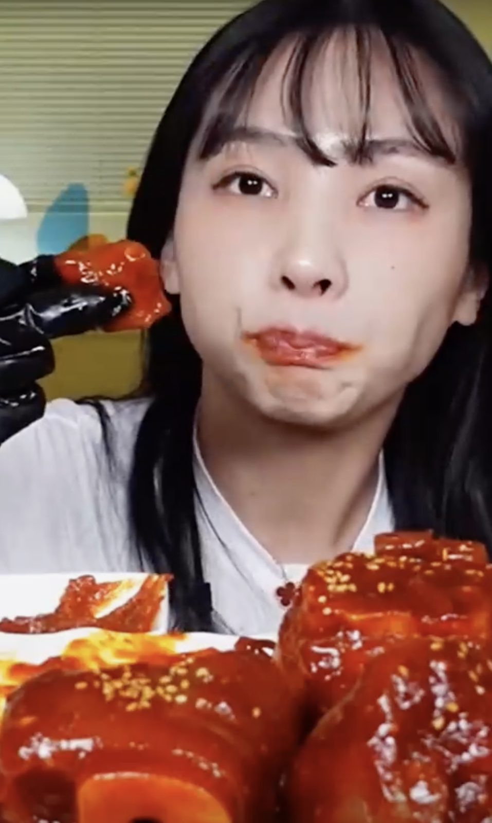 A picture of Mukbang YouTuber eating food
