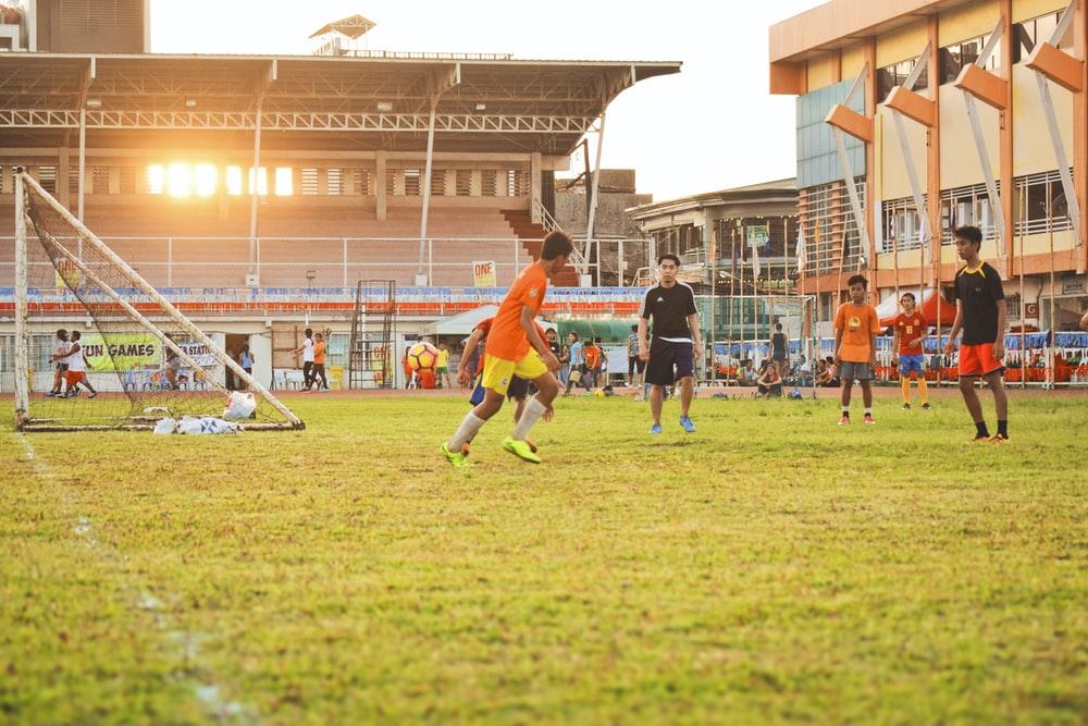 men playing soccer