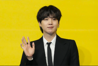 This contains an image of BTS SUGA