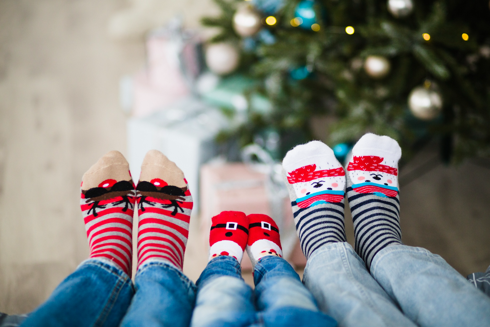 A group of people's feet in socks

AI-generated content may be incorrect.