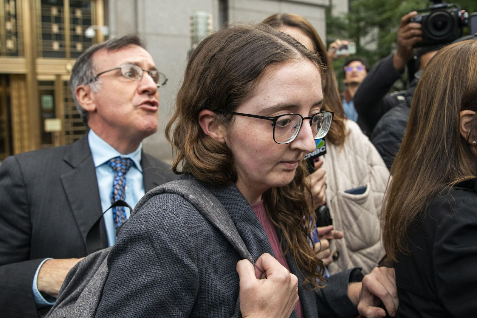 Caroline Ellison leaving courthouse Source: Courthouse News