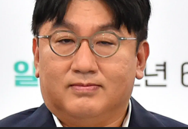 This contains an image of Bang Si Hyuk