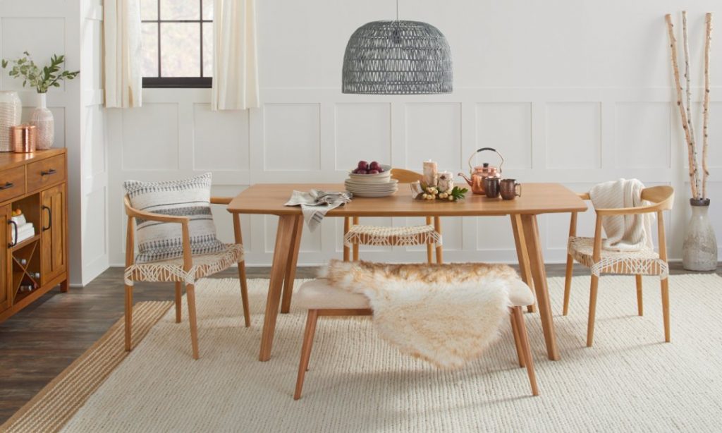 pillows and blankets in dining room for hygge decor