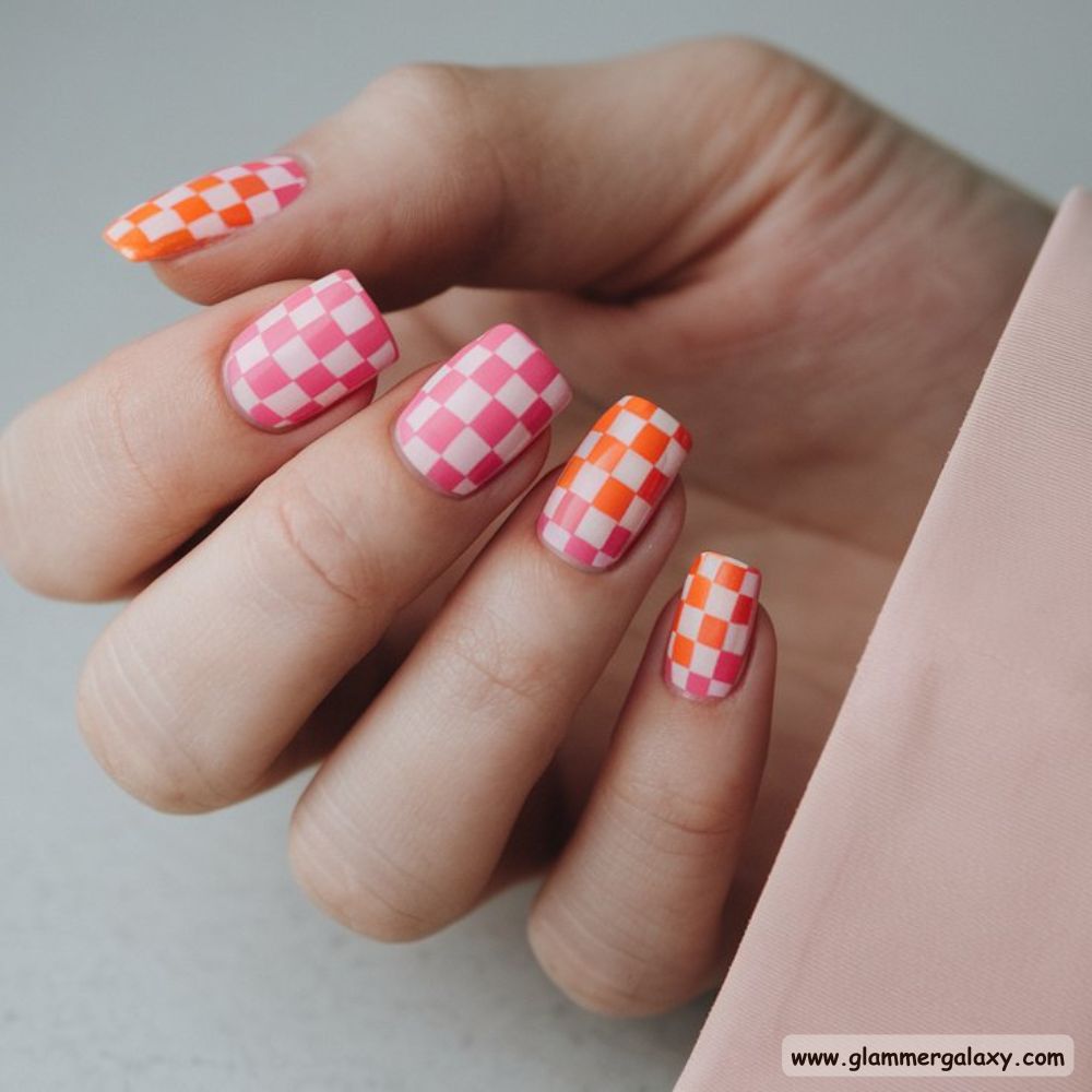 Orange and Pink Summer Nails with Chic Checkerboard Mani