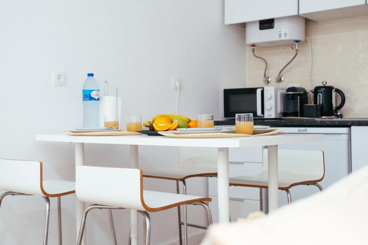 Kitchen with a set table featuring fresh food