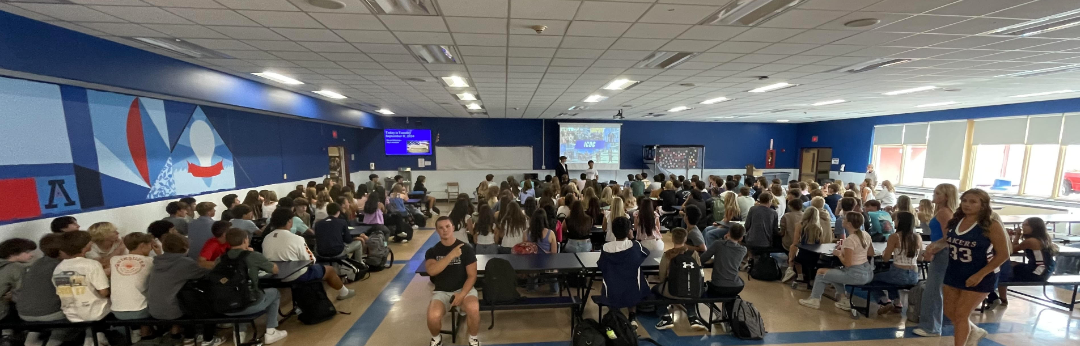 Image of students attending their first informational meeting for DECA