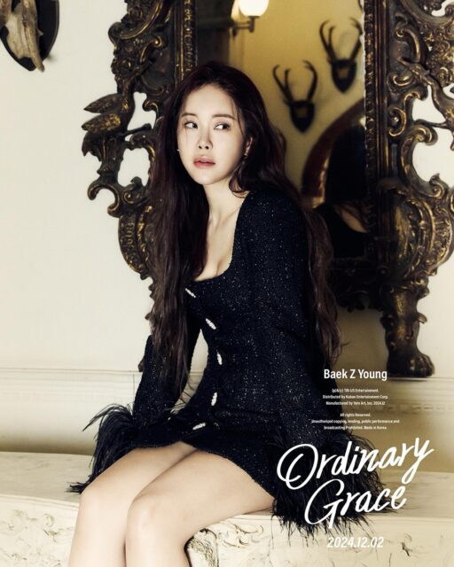 This contain an image of Baek Jiyoung on black   dress