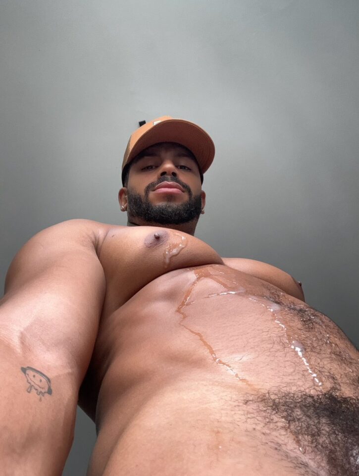 Lipe Scorpio taking an iphone selfie showing off his tits covered in jizz and cum