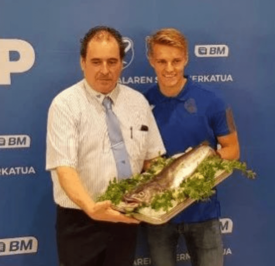 Martin Odegaard was presented with a fish by a local supermarket