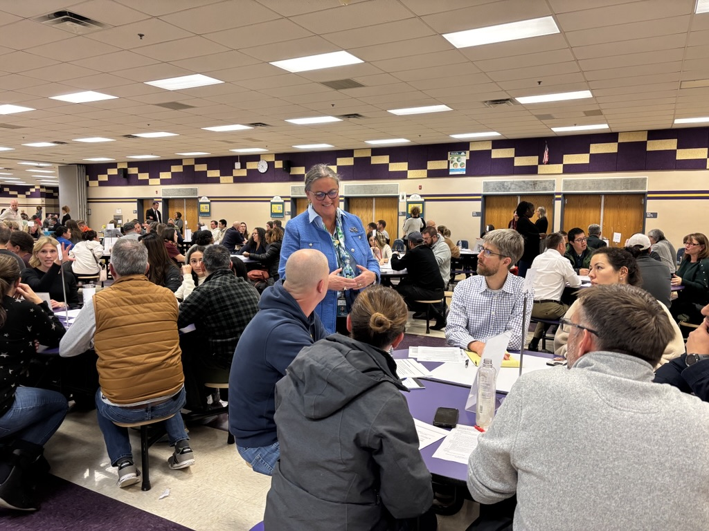 Dr. Reid speaking to a group of parents at a Boundary Review Community meeting at Westfield High School. 