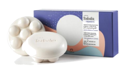 A white soap in a box

Description automatically generated